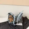 Estilo perezoso bolso pequeño plisado estampado de leopardo para mujer 2026 nuevo bolso de mano retro otoño e invierno sensación de alta gama bolso cruzado con correa ancha