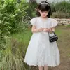 Nova Bolsa Infantil de Cor Sólida para Comércio Exterior Estilo Coreano Bolsa de Mão Princesa Simples Laço Mini Bolsa Transversal para Bebê