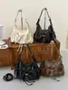 Bolsa tote de couro macio plissada de design retrô de nicho transfronteiriça para mulheres, moderna, simples, cor sólida, bolsa de mão e bolsa de ombro da moda