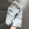 Pantalones Cortos de Seda Helada para Hombre 2026 Verano Nuevo Estampado Floral de Cinco Puntos Casual Deportivos de Playa para Hombre