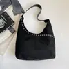 Bolso tote coreano 2026 nuevo con remaches, gran capacidad, cuero PU suave, bolso versátil para el día a día, bolso de hombro de moda nicho