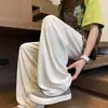Calça Casual de Seda Gelada com Caimento Fresco para o Verão 2025 Masculina Estilo Japonês Solta Calça Cimitarra Feminina Estilo Hong Kong Calça Reta de Perna Larga