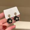 Pendientes de flor negra Aguja de Plata retro francés alto sentido nicho versátil temperamento pendientes Yiwu joyería al por mayor