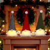 Nuevas Decoraciones Navideñas Muñeco de Guardabosques Tejido de Piernas Largas con LED con Luz Anciano sin Rostro Colgante para Árbol de Navidad
