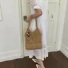 Bolso de Punto Hueco de Gran Capacidad Estilo Relajado para Mujer 2026 Nuevo Ligero Versátil para Viajes Diarios Bolso de Hombro Bolso Cubo