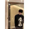 Outono e Inverno 2025 Roupa de Casal Estilo Preguiçoso Masculino e Feminino Imitação de Visão Macia Waxy Gola Redonda Pulôver de Malha Cartoon Tendência
