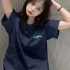 Camiseta de Manga Corta con Cuello Redondo de Seda de Leche para Pareja 2026 Nueva Moda de Verano Diseño Versátil Top Estampado