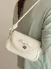 Elegante y versátil popular bolso de hombro con lazo, nuevo bolso cruzado de moda de verano 2026 para el trabajo con un aire casual