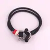 Europa y Estados Unidos transfronterizo nuevo hebilla de herradura de arco pulsera de cuerda de paraguas giro rápido moda playa pulsera de cuerda de cuero al por mayor