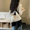 Bolso de mujer de diseño nicho de moda estilo coreano 2026 nuevo bolso de hombro versátil para el trabajo mochila de gran capacidad multiusos