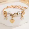 Pulsera de Hueso de Serpiente con Cuentas Doradas DIY con Colgante de LOVE y Flor, Pulsera Ajustable de Lujo Ligero para Niñas, Venta al por Mayor