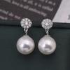 Pendientes elegantes con diseño de explosión de perlas Shijia 2025, cuidadosamente seleccionados, de lujo, de alta gama, de plata S925 para mujer.