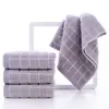 Toalla de lavado facial al por mayor para el hogar de algodón unisex toalla facial de algodón absorbente de pelusa toalla de baño empaque independiente