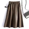 Falda de Cuero para Mujer Primavera y Otoño 2026 Falda Midi Acampanada de Cintura Alta Adelgazante Falda de Cuero Línea A con Dobladillo Amplio en el Estilo Trendy Maduro