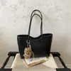Bolsa de ombro feminina transfronteiriça 2026 nova, bolsa tote simples e casual, grande capacidade, estilo retrô, adequada para escola e trajeto