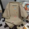 Nuevo diseño estilo americano lindo y divertido camiseta de manga corta color albaricoque para mujer, verano algodón puro holgada casual nicho top