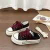 Zapatos de lona blancos de estilo coreano con diseño de grulla de almohada, de caña baja y punta redonda para mujer, nueva colección de verano 2026, sin cordones, versátiles, casuales y ligeros
