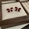 Pendientes de lazo de flocking dulce francés con circonita, elegantes, de lujo ligero, de alta gama, de moda, combinan con todo, tachuelas para orejas de dama
