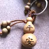 Fábrica atacado chaveiro evento presente pequena cabaça chaveiro ornamentos cabaça de madeira chaveiro presente