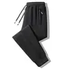 Pantalones gruesos de lana de cordero para hombre, pantalones largos extra gruesos con forro polar de invierno, pantalones de chándal de otoño e invierno, pantalones casuales con forro polar transfronterizos
