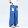 Pantalones deportivos de chándal retro americanos azules con diseño de cordón estampado para hombre y mujer, pantalones largos rectos de pierna ancha para primavera y otoño 2026