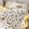 Juego de cama de cuatro piezas Clase A hecho de algodón puro tipo puff, sábana y funda de edredón estilo ins frescas y delicadas con borde de concha, juego de tres piezas para dormitorios de estudiantes