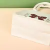 En stock: Bolsa de lona con diseño de Santa Claus para Navidad, bolsa de regalo, recuerdo de fiesta navideña, bolso de mano festivo