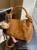 Bolsa Feminina 2025 Nova Moda Outono e Inverno High-End Retrô para o Dia a Dia Feminina Ombro Único Transversal Bolsa Bolinho