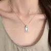 2026 Nuevo Modelo Collar Colgante Pez Pequeño Aguamarina para Mujer, Gargantilla de Perlas Estrella de Mar, Cadena Clavicular de Lujo Ligero Gama Alta Al por Mayor