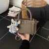 Bolsa de Mão e Bolsa Transversal Estilo Novo Primavera 2026 Transfronteiriça, Bolsa Saco Nicho Coreana para o Dia a Dia, Bolsa de Ombro Moda Retrô Feminina