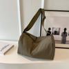 Bolso de tela estilo japonés estilo perezoso, bolso bandolera de lona para mujer, bolso de hombro pequeño de nailon para estudiante, bolso para dumplings que combina con todo.