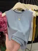 Regata canelada de algodão com gola redonda e sem mangas, estilo minimalista para mulheres, estilosa, rejuvenescedora, versátil, elegante, modeladora, adequada para usar por cima ou como camada, top da moda