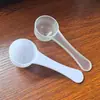 Fábrica atacado branco a granel PP pequena colher 10g20ml plástico pequena colher capacidade colher pode ser logotipo impresso