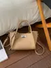 Exquisita y Compacta Bolsa Cesta de Verduras para Mujer 2026 Primavera Nueva Bolso de Hombro Cruzado de Cuero Suave Bolso de Mano para Viajes Diarios Bolso Cubo