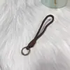 Popular Creativo Simple Lanyard para Teléfono Móvil Portatarjetas de Muñeco Pase de Abordar Llavero de Mochila Cuerda Tejida Colorida Adornos Colgantes