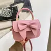 Bolso Cuadrado Pequeño de Mano Moderno y Sencillo Bolso de Lazo de Nicho para Mujer Nuevo Llegado Otoño 2026 Bolso Cruzado de Textura Moderna y Elegante