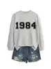 Amazon eBay sitio independiente casual simple cómodo mujer 1984 digital otoño e invierno nuevo cuello redondo manga larga sudadera
