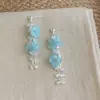 Pendientes frescos y dulces estilo vacacional con borlas florales, borlas de perlas estilo francés, pendientes llamativos de lujo ligero y alta gama