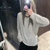 2026 Super Quente Casual Listrada de Manga Longa Camiseta para Mulheres Início do Outono Versátil Preguiçosa Solta Emagrecedora Confortável Top