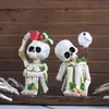 Adornos de Halloween para Nuevo Producto Transfronterizo Set de Dos Calaveras Pensantes de Resina Maceta de Jardín Exterior Césped Decoraciones para el Hogar