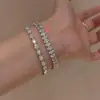 Popular pulsera de cadena de tenis de circón de lujo con detalles de diamantes, moderna, exquisita, versátil y elegante para mujer