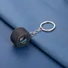 Nuevo llavero colgante de neumático de coche de goma blanda de PVC, accesorios de simulación, modelo de cubo de rueda modificado, llavero de silicona