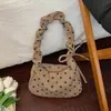 Bolsa de mano tipo bolsa de dumplings coreana, bolsa de mano de tela de pana, nueva colección primavera 2026, bolso de hombro casual de lunares, bolsa versátil para el antebrazo
