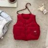 Conjunto de tres piezas para bebé estilo coreano otoño e invierno de 1 a 3 años 2026 nuevo chaleco ligero de plumas y mallas traje térmico