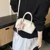 Bolsa de Bowling Portátil de Nicho para Mujer 2026 Nueva Moda Bolso Almohada para Viajero Estilo Coreano Bolso Cruzado de Moda