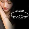 Versão Coreana do Sinal de Felicidade Feminina Duplo Coração Pulseira Feminina Banhada a Prata Joias Europeias e Americanas Atacado Joias da Moda