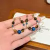 Novos Brincos Estilo Chinês Retrô Pedra Olho de Tigre Pérola Brincos de Design de Nicho para Mulheres Brincos Novos 2025