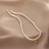 Elegante Colgante de Frijol Dorado Pequeño con Perla Collar para Mujer Estilo Europeo y Americano Moda Accesorio de Lujo Ligero Cadena de Clavícula de Celebridad de Internet de Moda