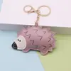 Colgante Llavero Erizo de Cuero PU de Moda Transfronterizo, Accesorio Decorativo Creativo para Bolsos y Mochilas, Venta al por Mayor desde Fabricante