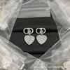 Nuevos Pendientes de Nariz de Cerdo Cd de Alta Gama de la Colección Dior/Dior Finamente Elaborados para Mujer con Inscripción del Logo Venta al por Mayor
